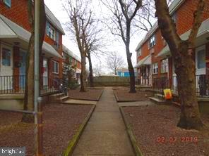 a view of a pathway with a building