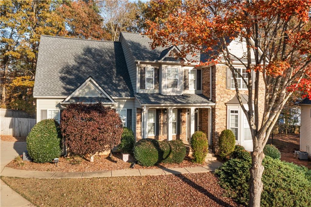 front view of a house with a yard