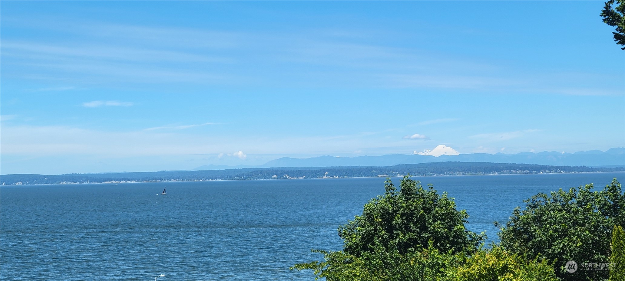 a view of a lake and mountain in the back