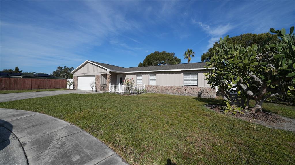 a view of a house with a big yard