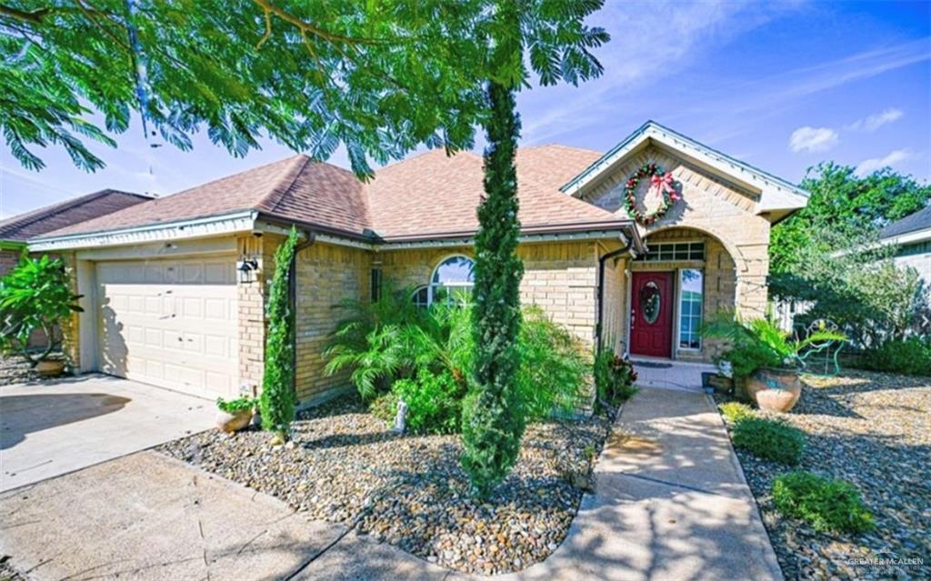 Ranch-style home with a garage