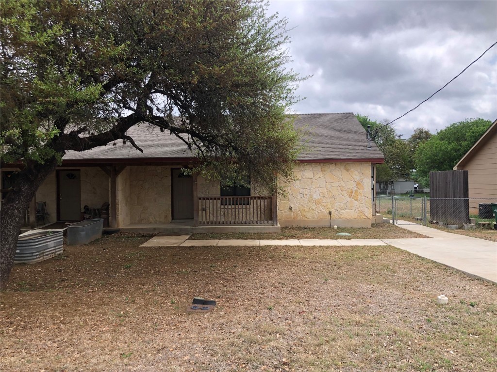 Front yard, driveway, and front porch