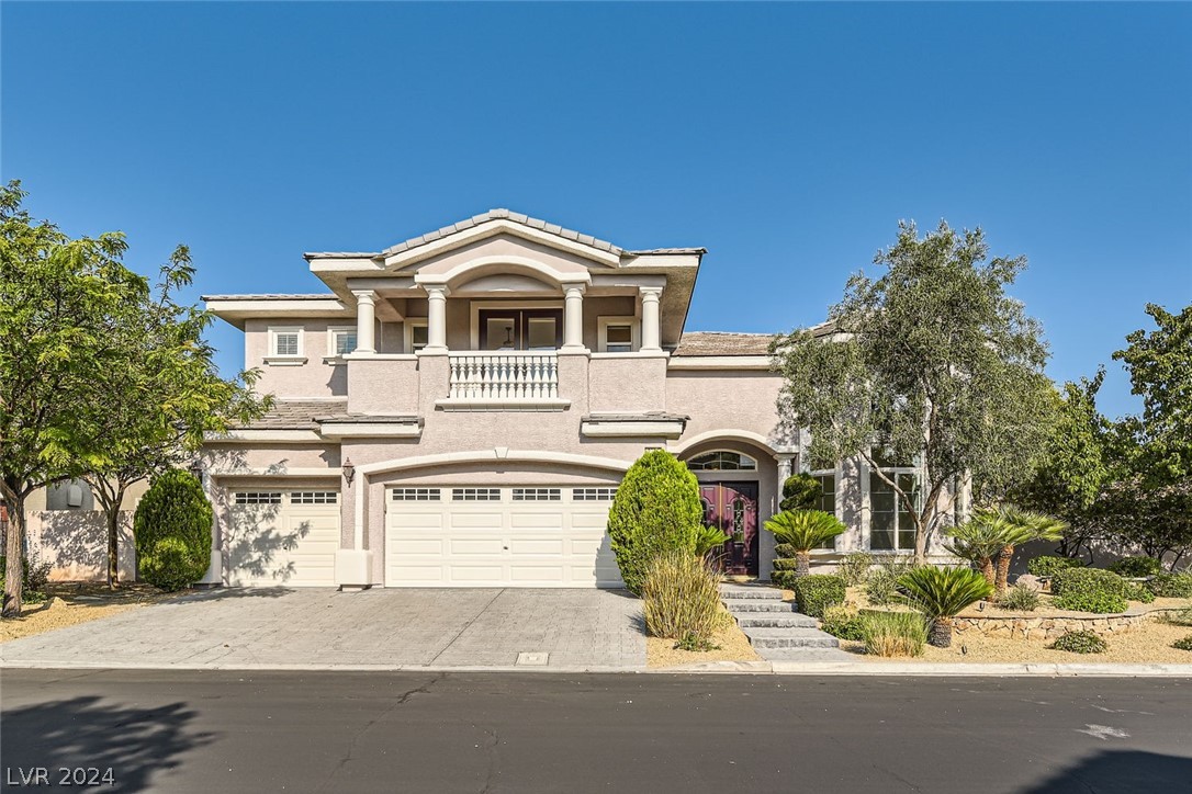 Mature landscaping; three car garage