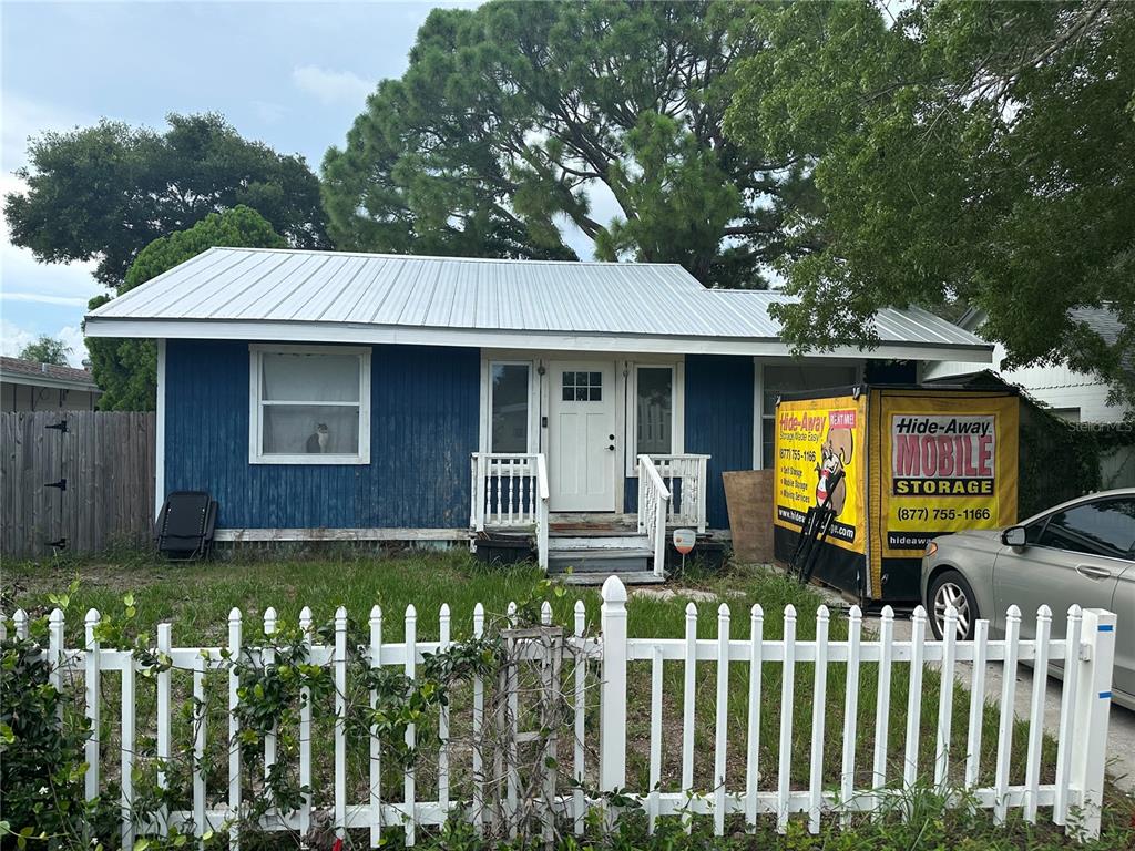 a front view of house with yard