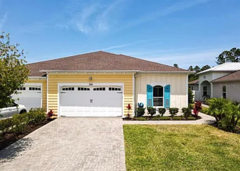 a front view of house with yard