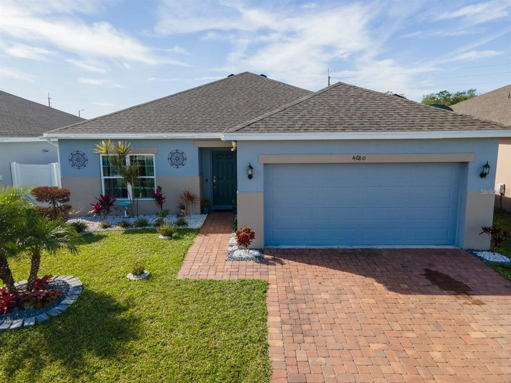 a front view of house with yard