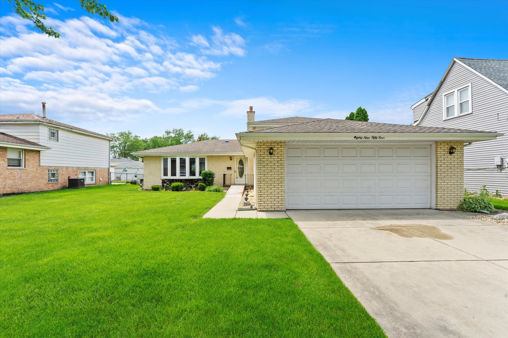 a view of outdoor space yard and front view of a house