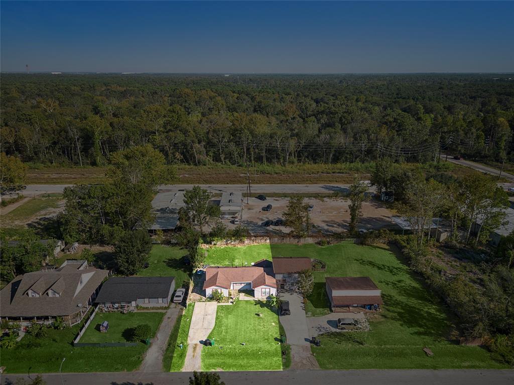 an aerial view of a house with garden space