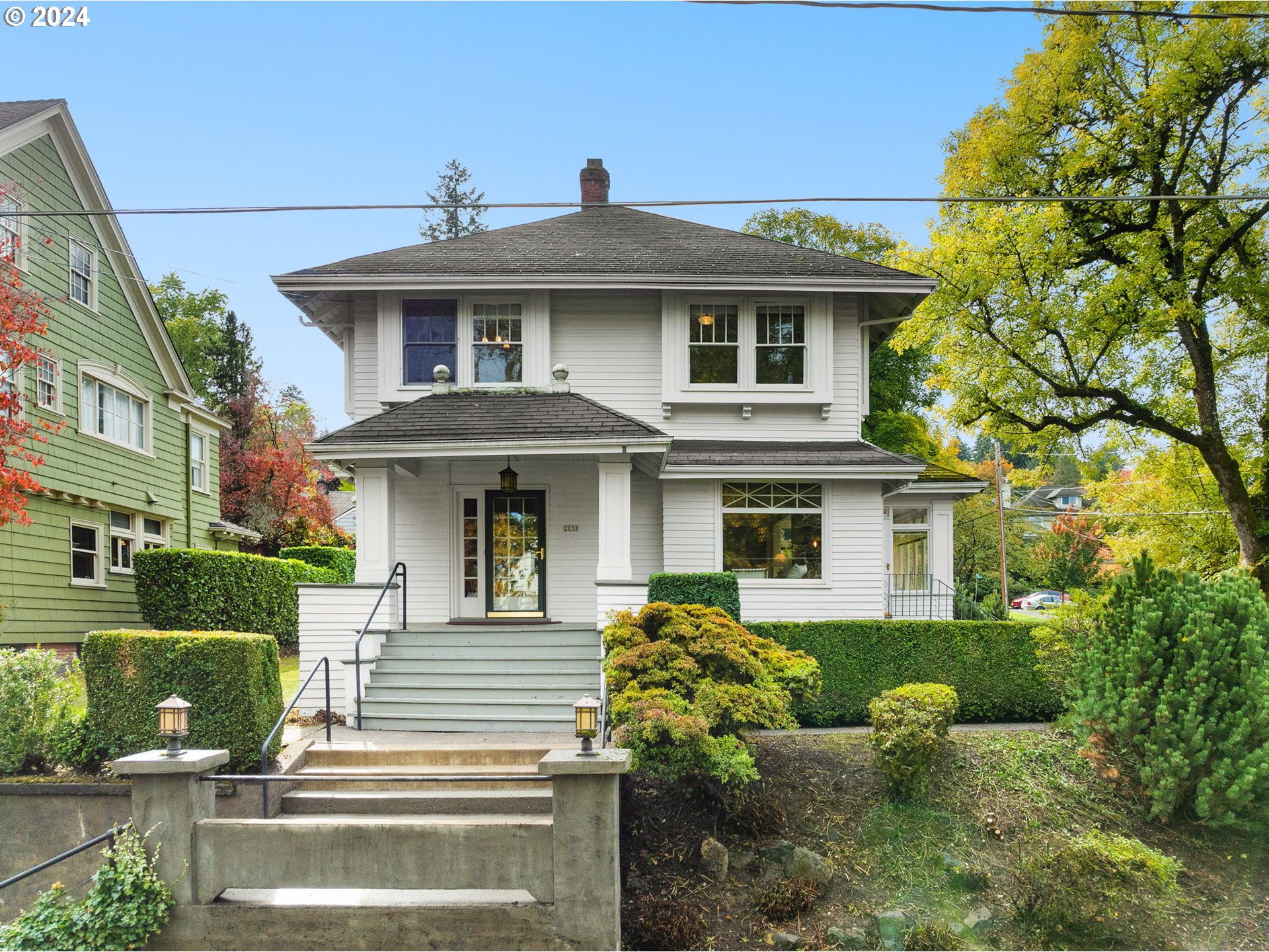 a front view of a house with a yard