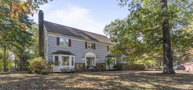 a front view of house with yard