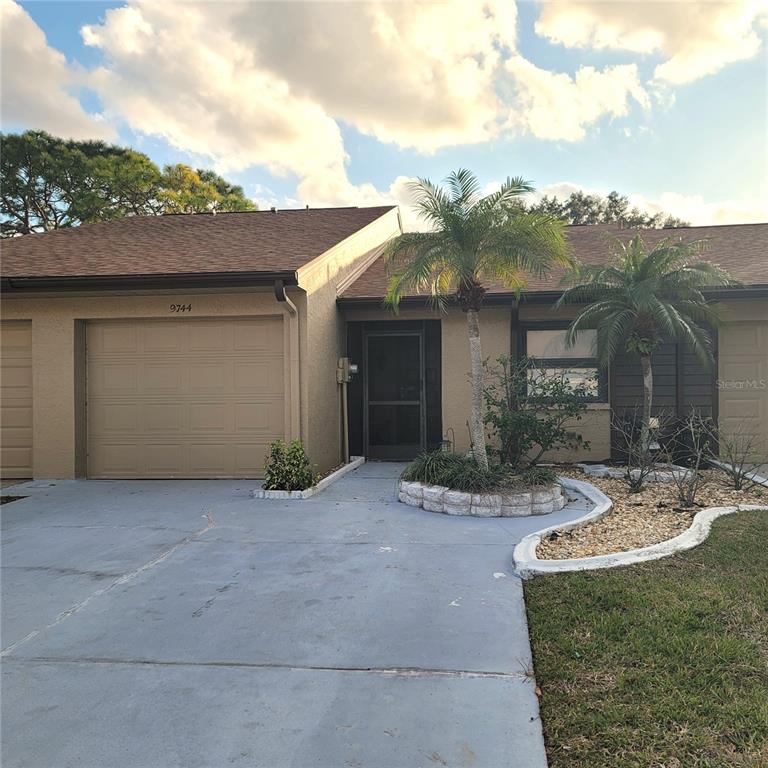 front view of house with a yard