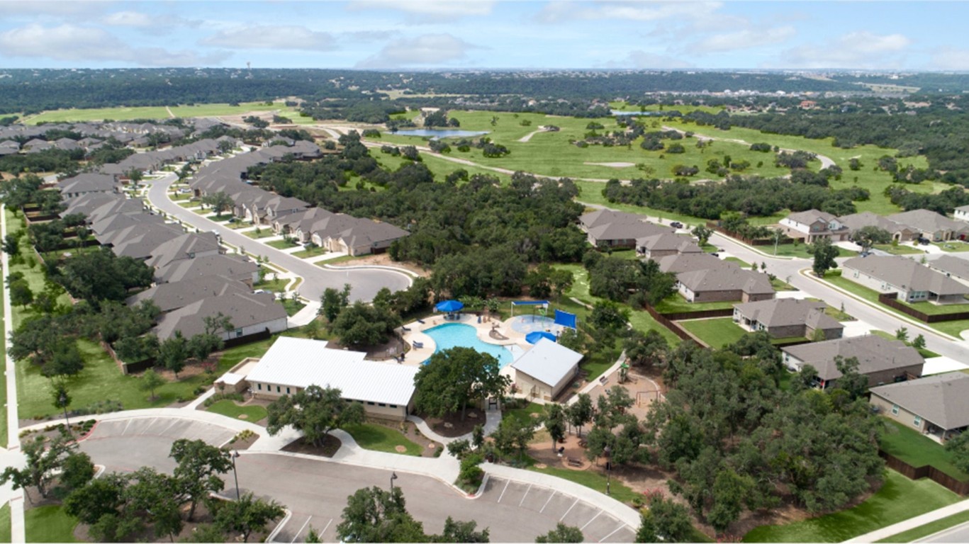 an aerial view of residential house with outdoor space