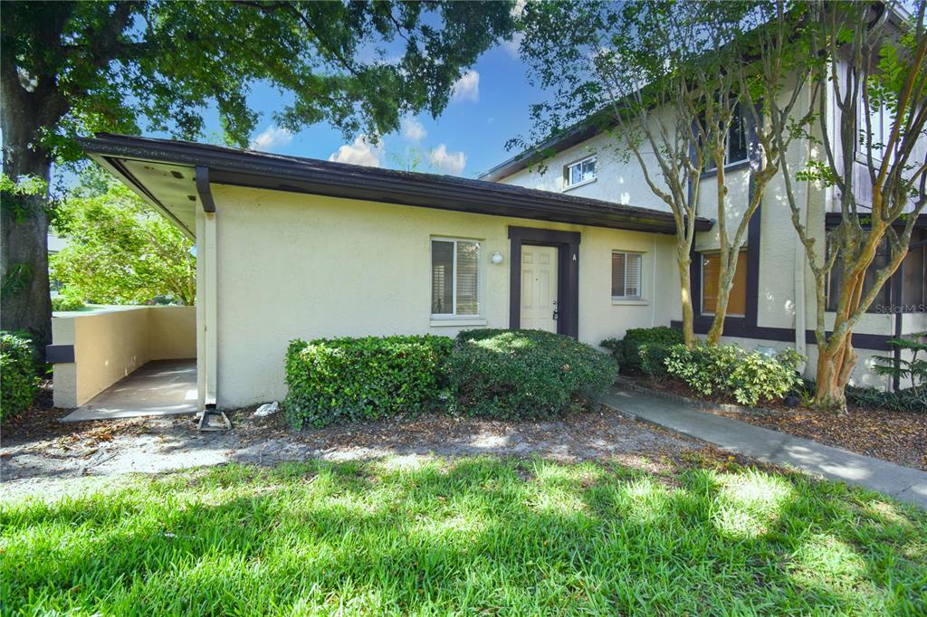 front view of a house with a yard