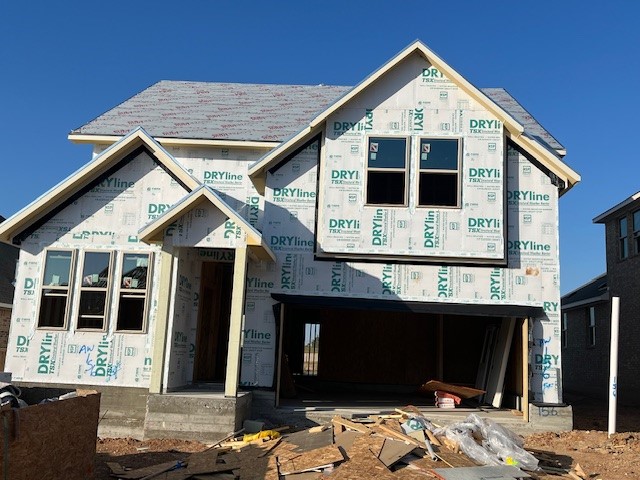 a view of a house with a lounge chair