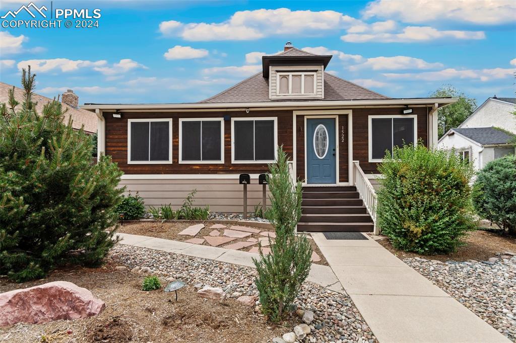 Nice O-Scaping. Newer front composite porch/stairs into home.