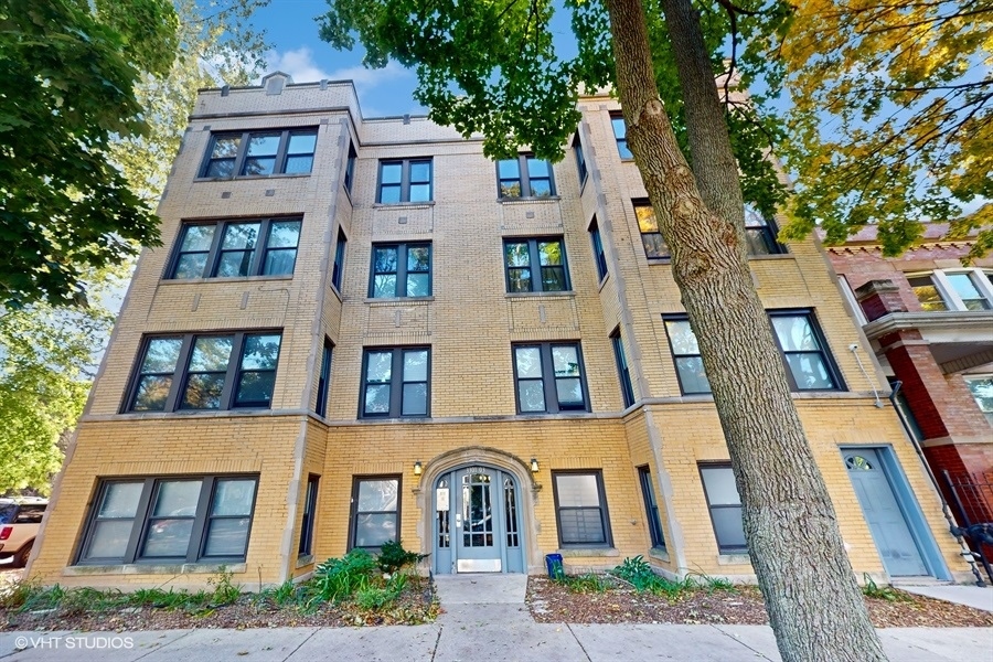 a front view of a multi story residential apartment building