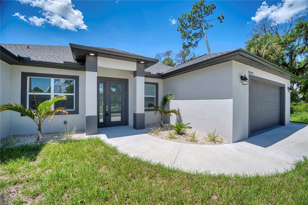 a front view of a house with patio