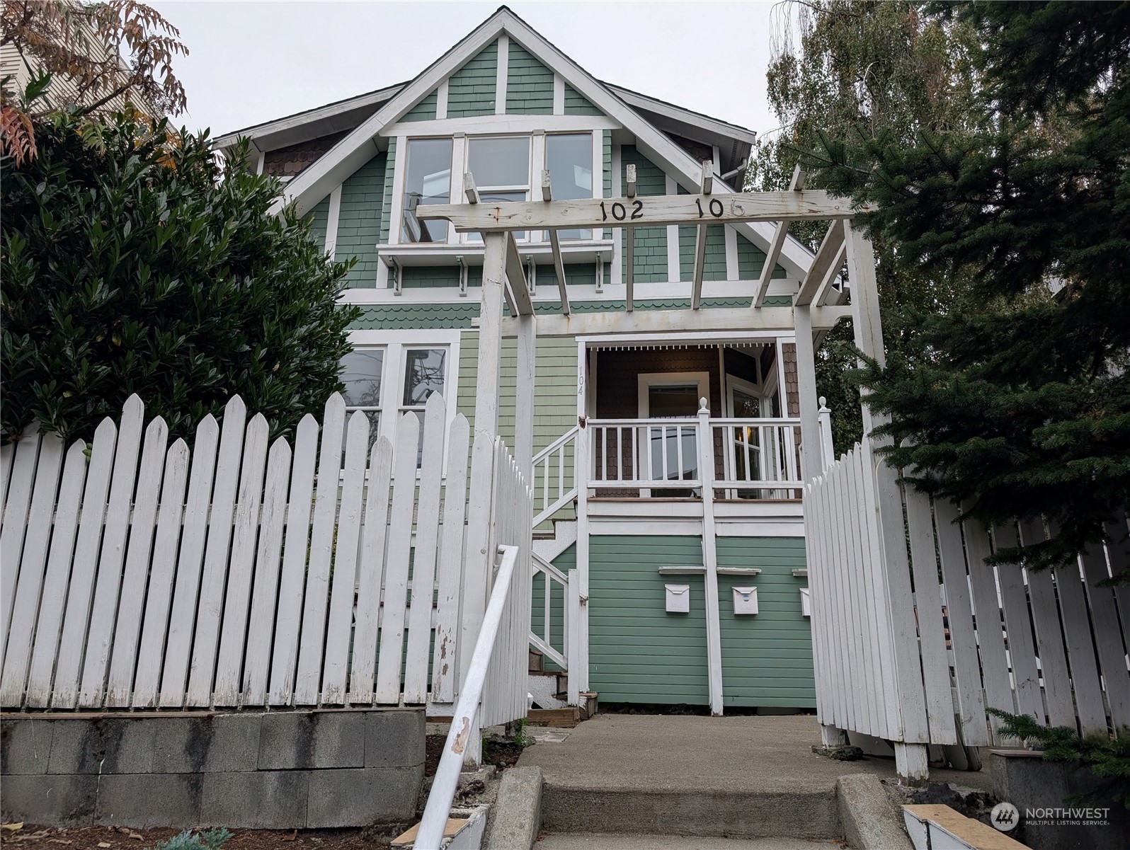 a front view of a house with a porch