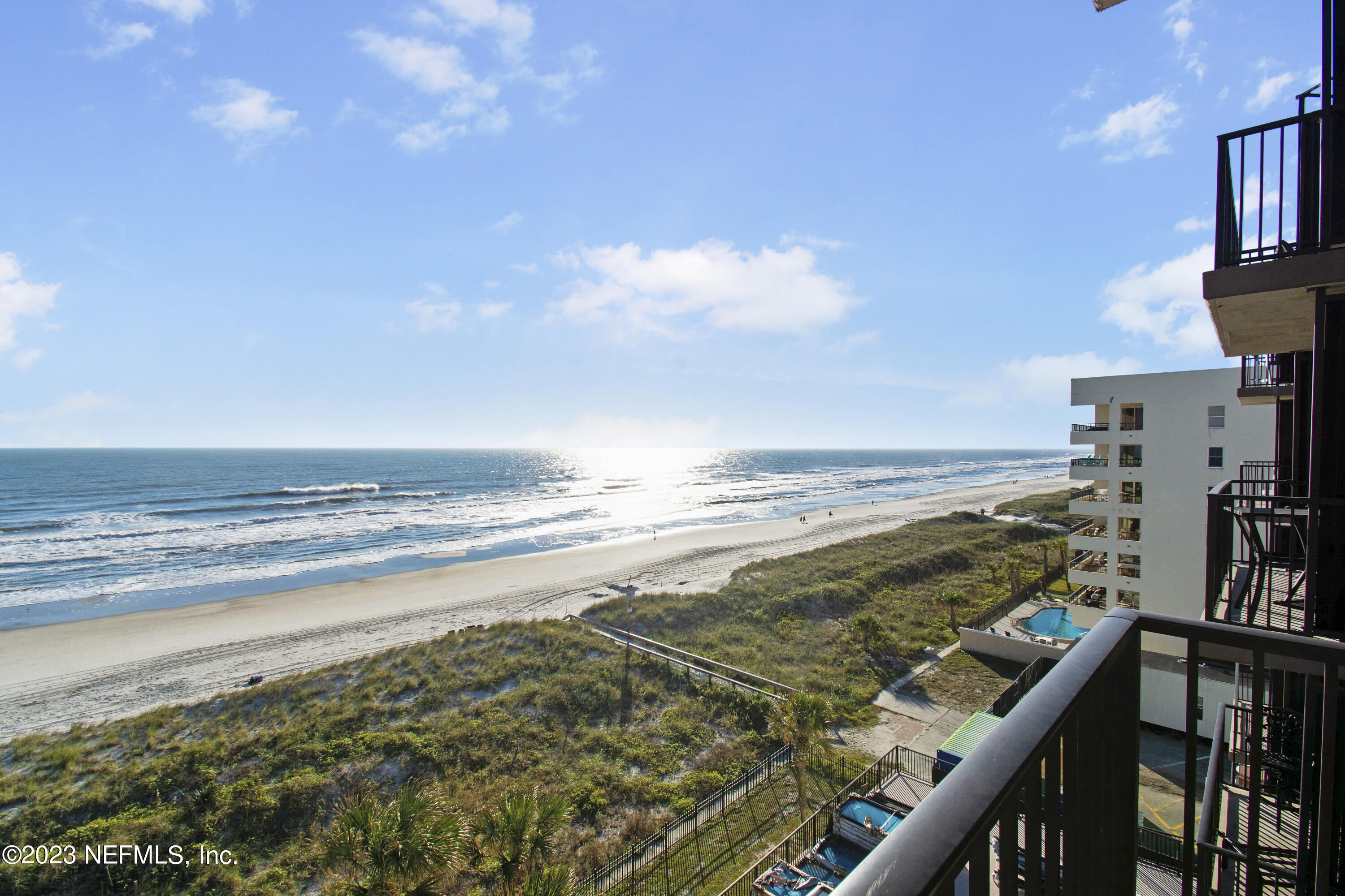 a view of an ocean from a balcony