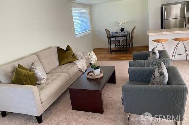 a living room with furniture and a couch