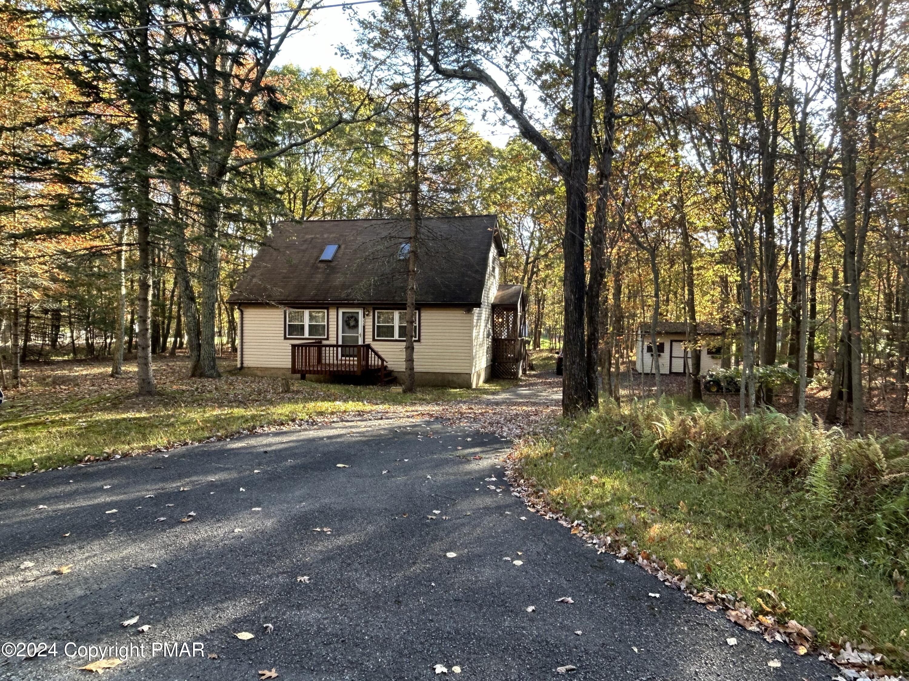 a view of house with a street