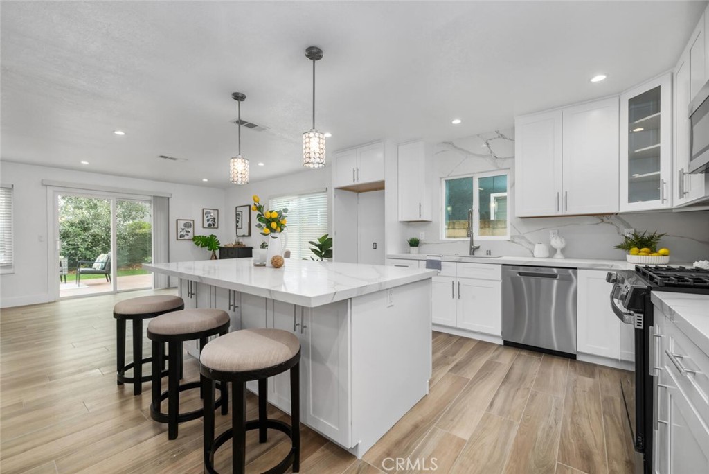 White Shaker Cabinets, Quartz Counters....all New Stainless Steel Appliances....Stunning!  Newly Remodeled!