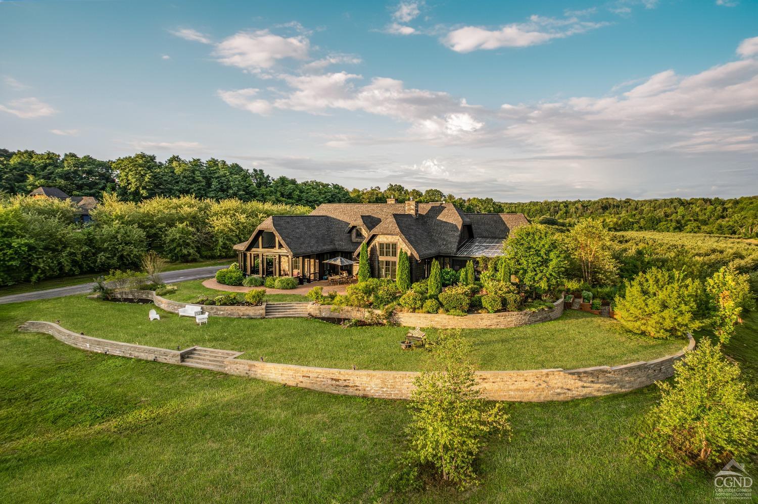 a view of a house with a big yard