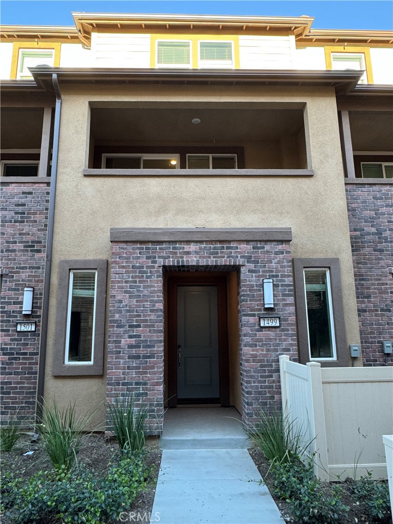 a front view of a house with a garage