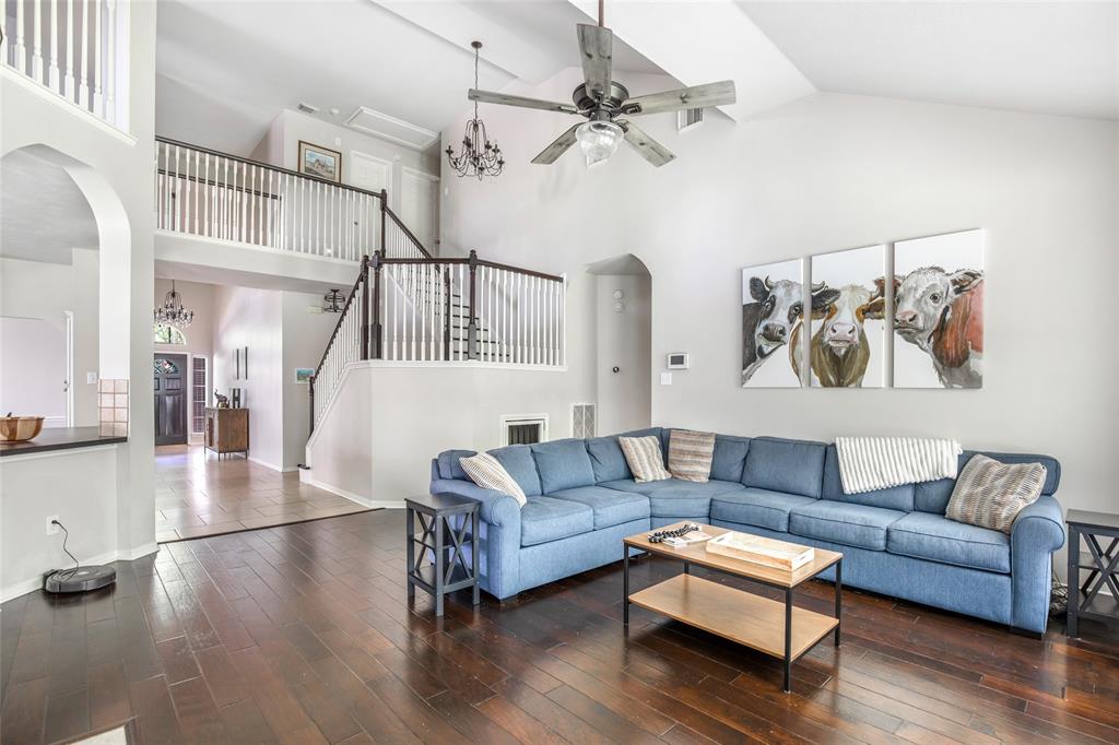 The grand staircase is a stunning compliment to this home.