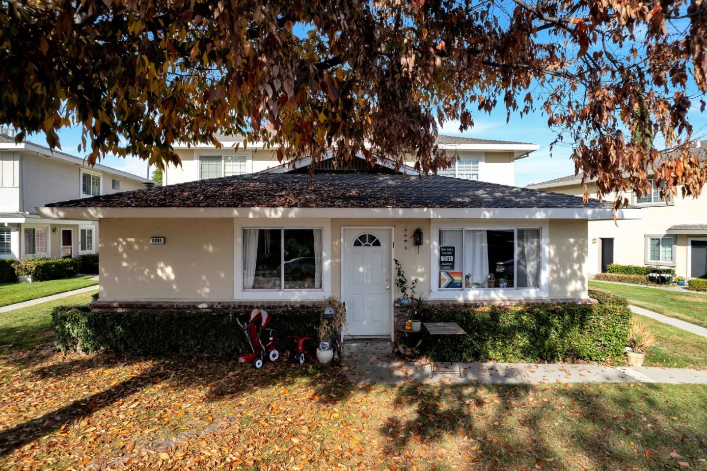 a front view of house with yard patio and green space