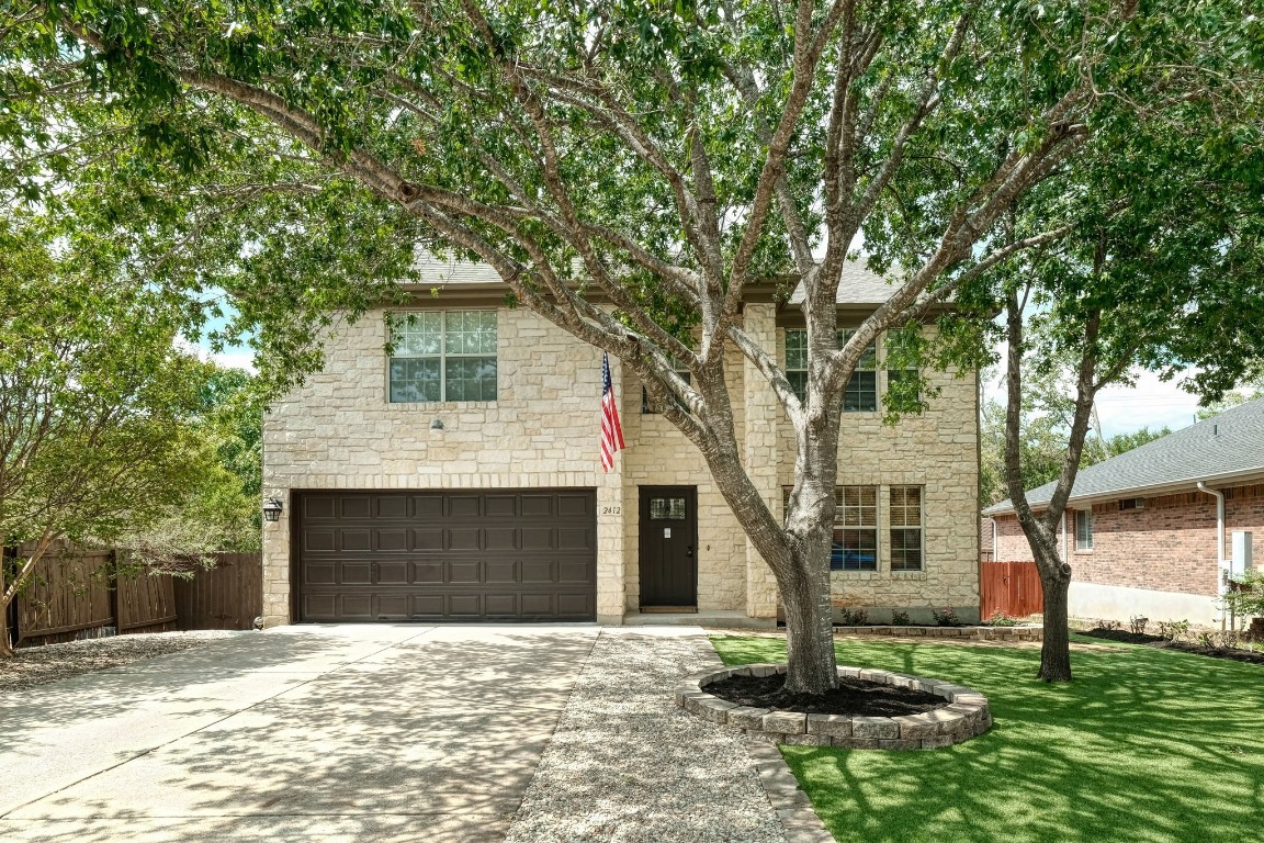 Welcome home to Willow way! Mature trees greet you and create shade from the Texas sun while the astroturfed zeroscape yard makes for a sleek look with easy maintenance.