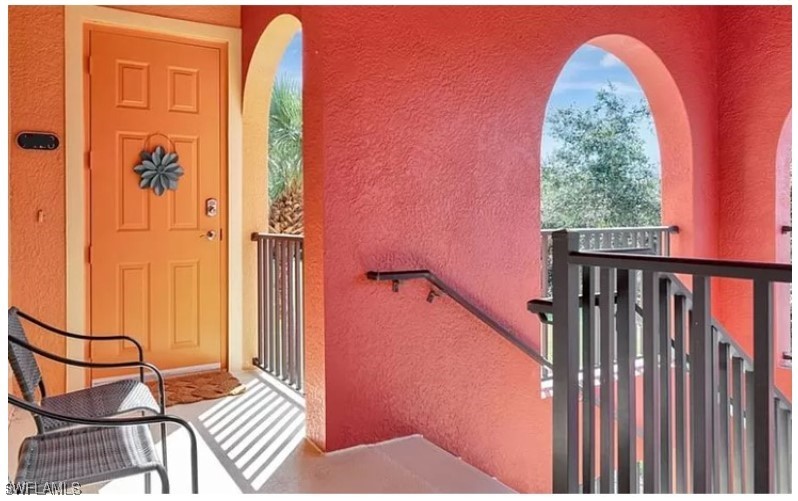 a view of balcony with a potted plant