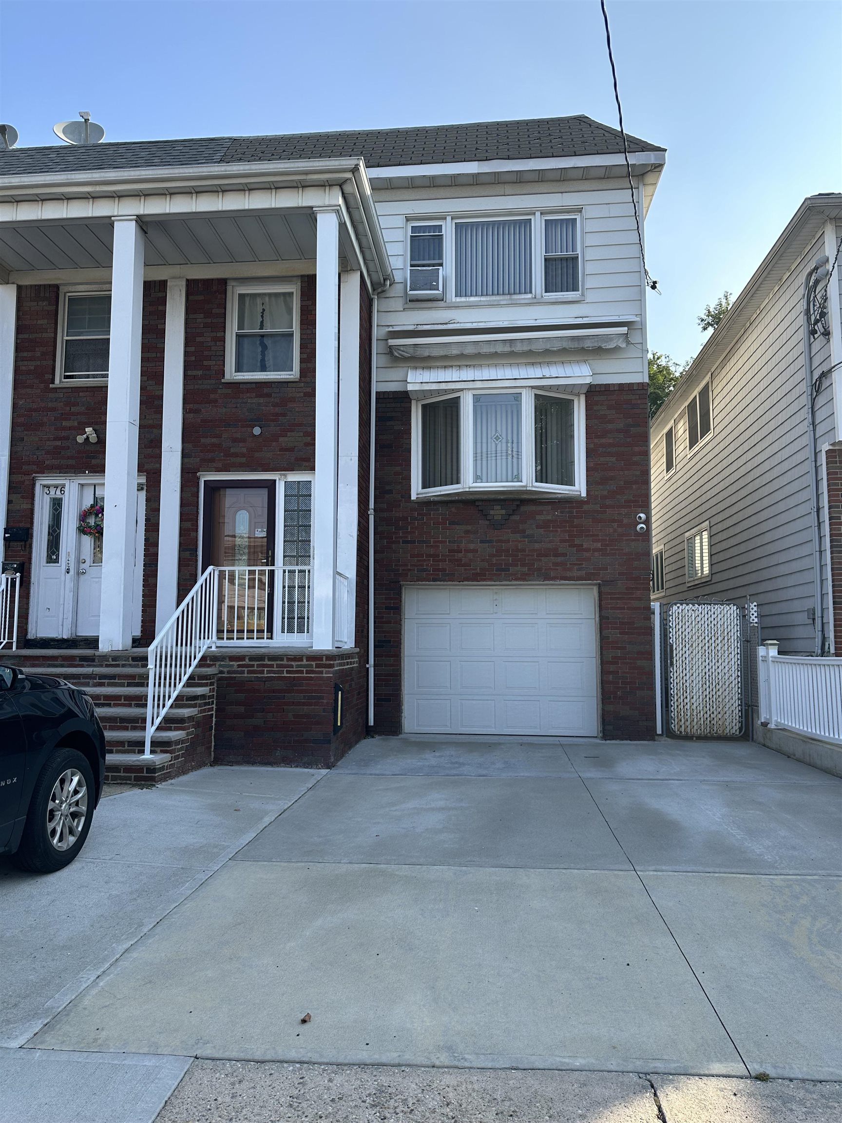 a car parked in front of a house