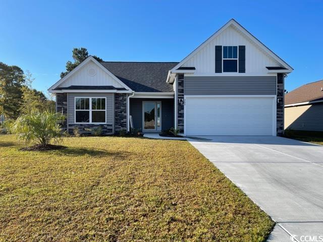 View of front of house featuring a front yard and