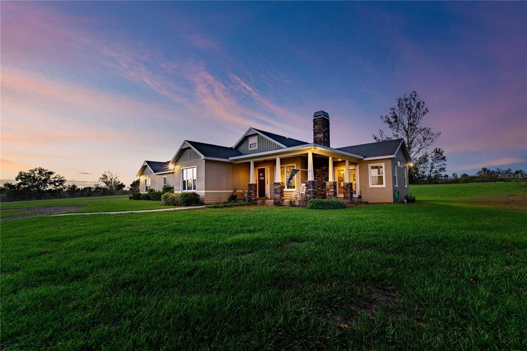 a view of a yard in front of a house