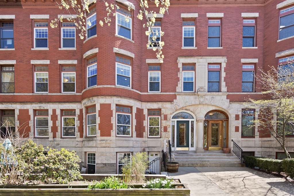 a front view of a multi story residential apartment building