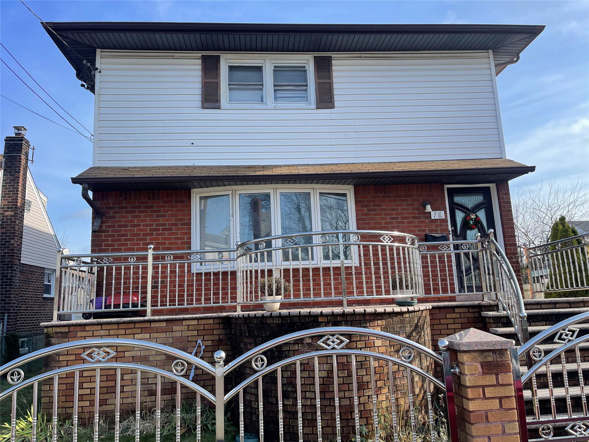 a front view of a house with balcony