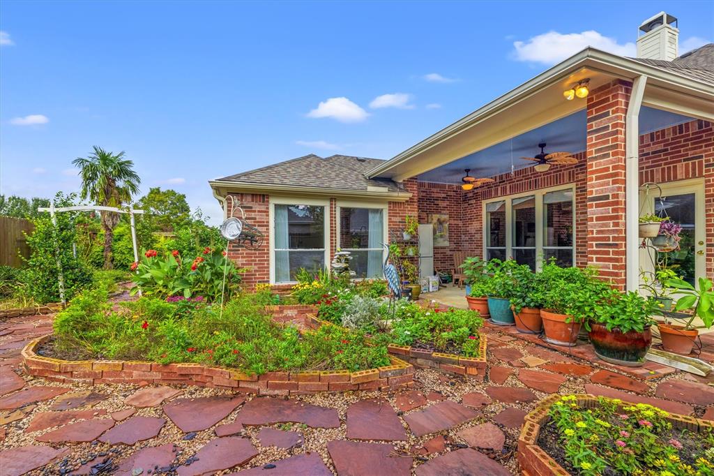 Discover serenity in your backyard oasis, complete with the tranquil sounds of water features and an array of vibrant plants. Enjoy the citrus bounty from your own Orange, Lime, and Banana Trees. This space is ready for your personal touch.