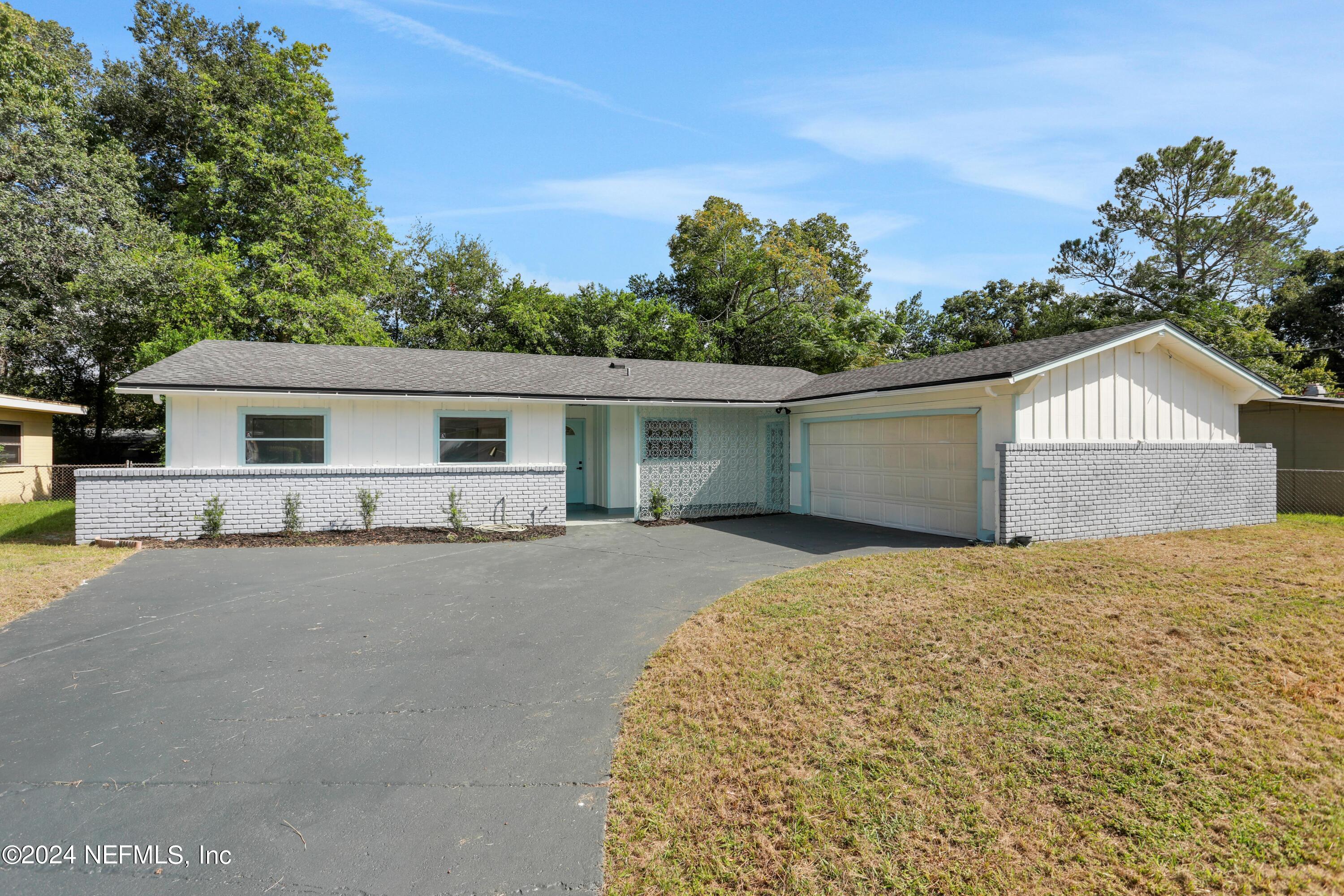 front view of house with a yard