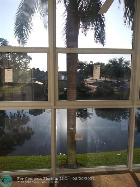 a view of a balcony with a lake view