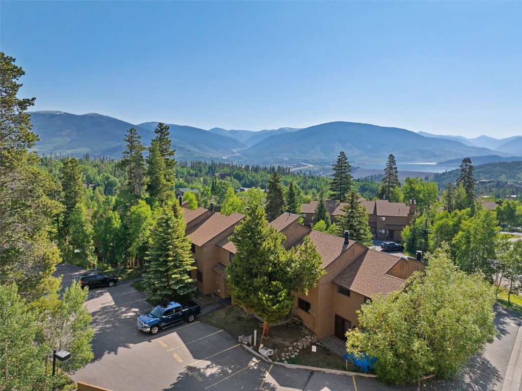 an aerial view of a house with mountain view