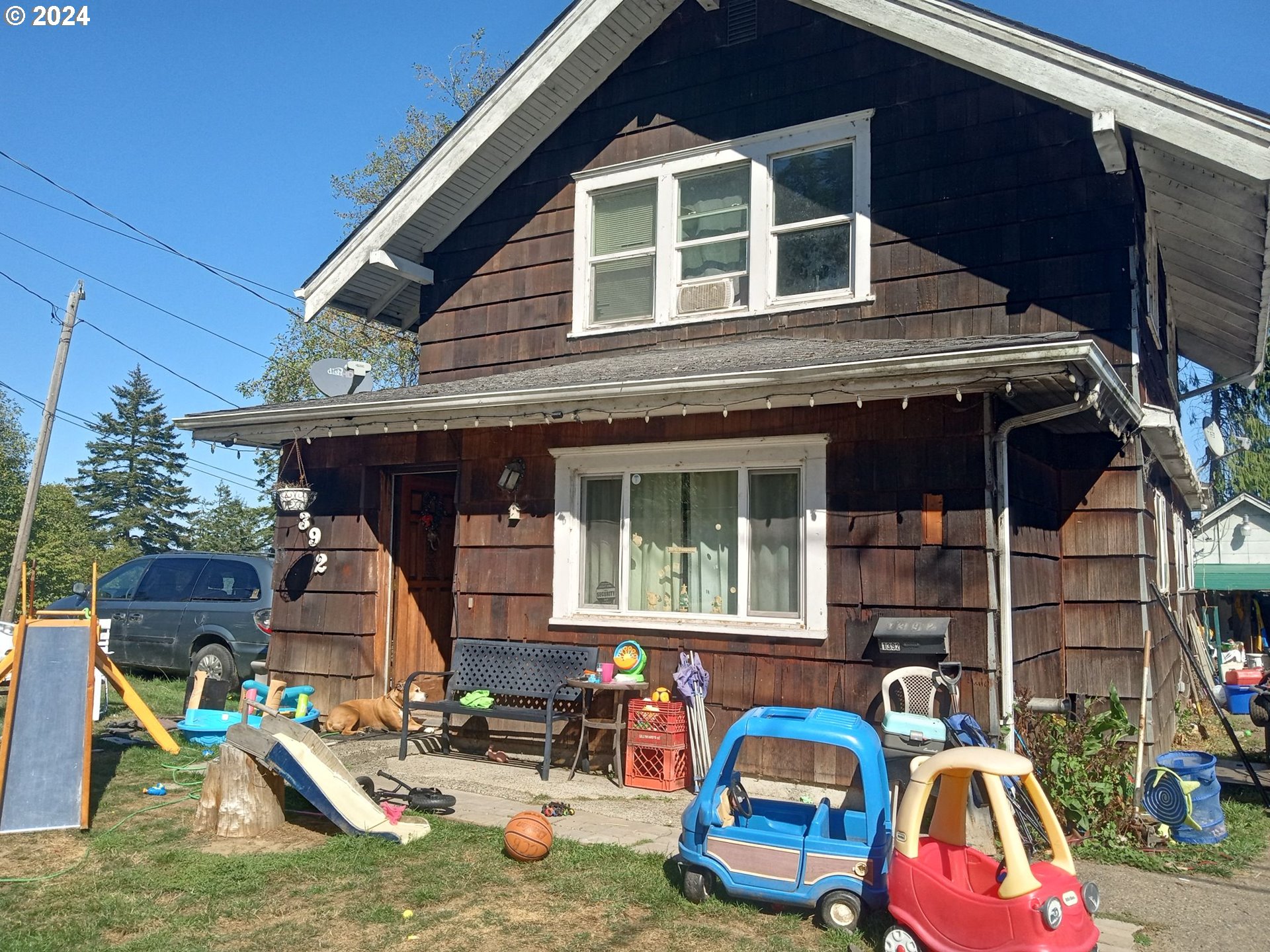 a front view of house with outdoor space