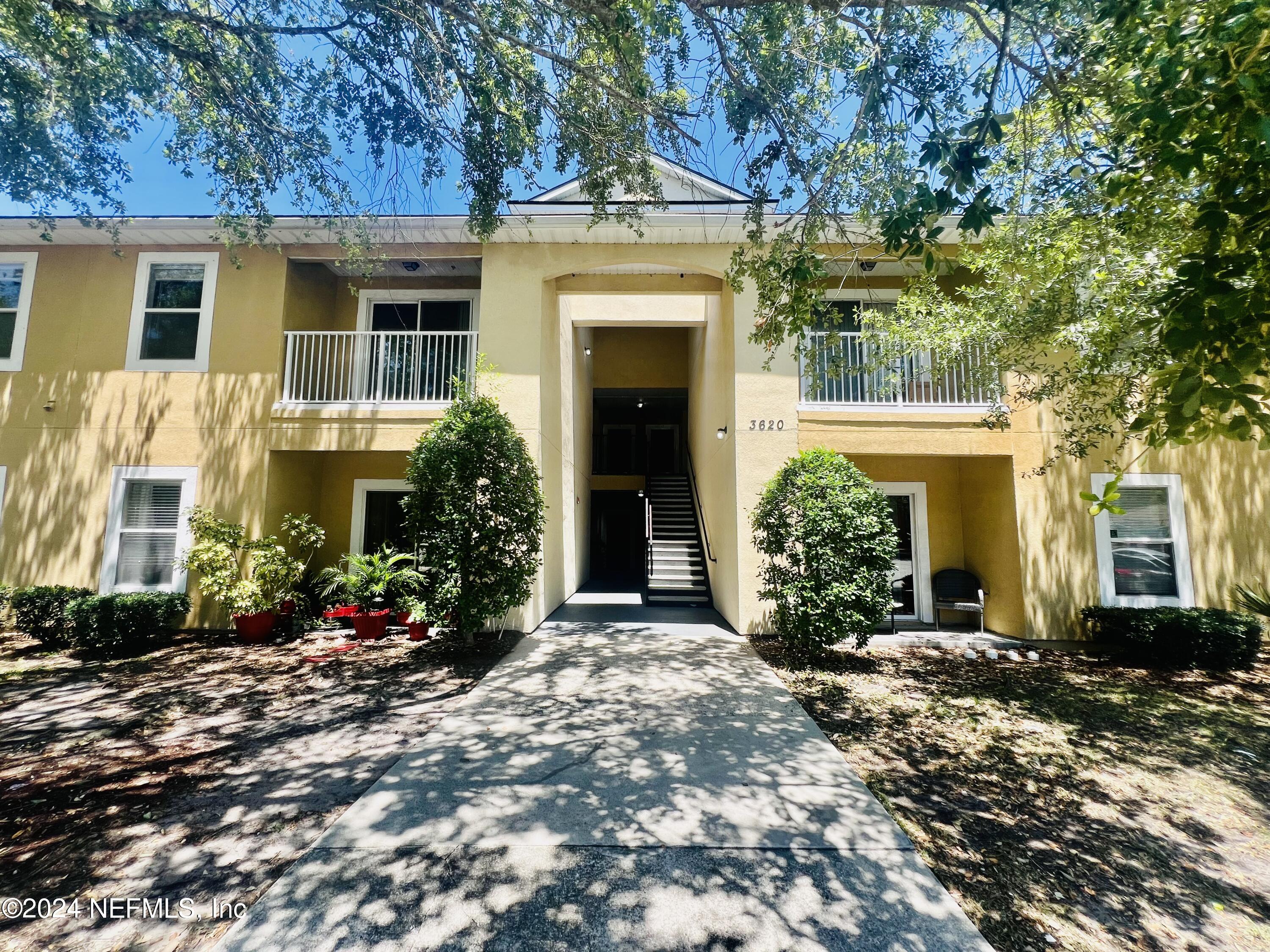 a front view of a house with a porch