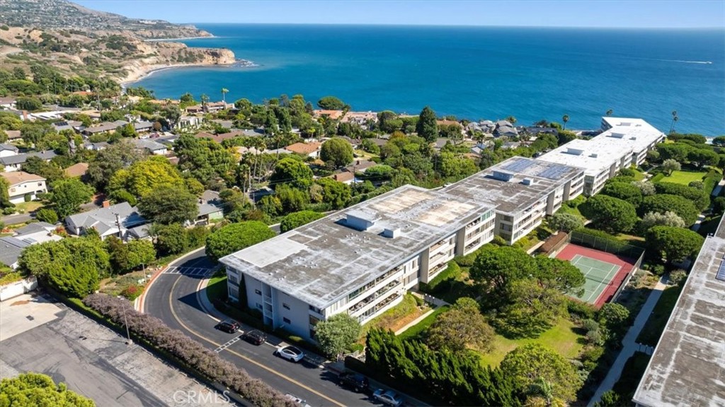 an aerial view of a house with a garden