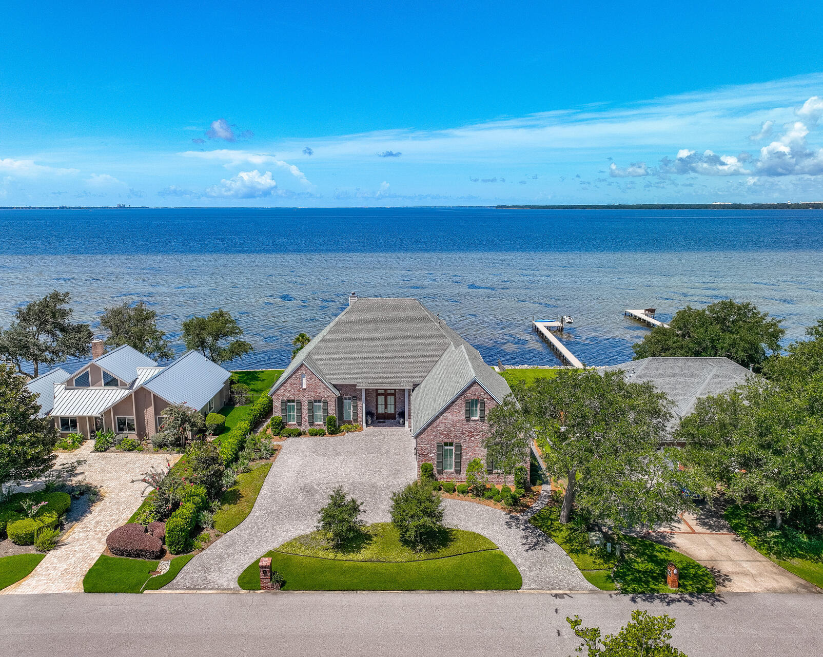 an aerial view of a house with outdoor space