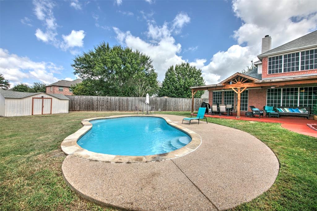 a view of outdoor space yard swimming pool and patio