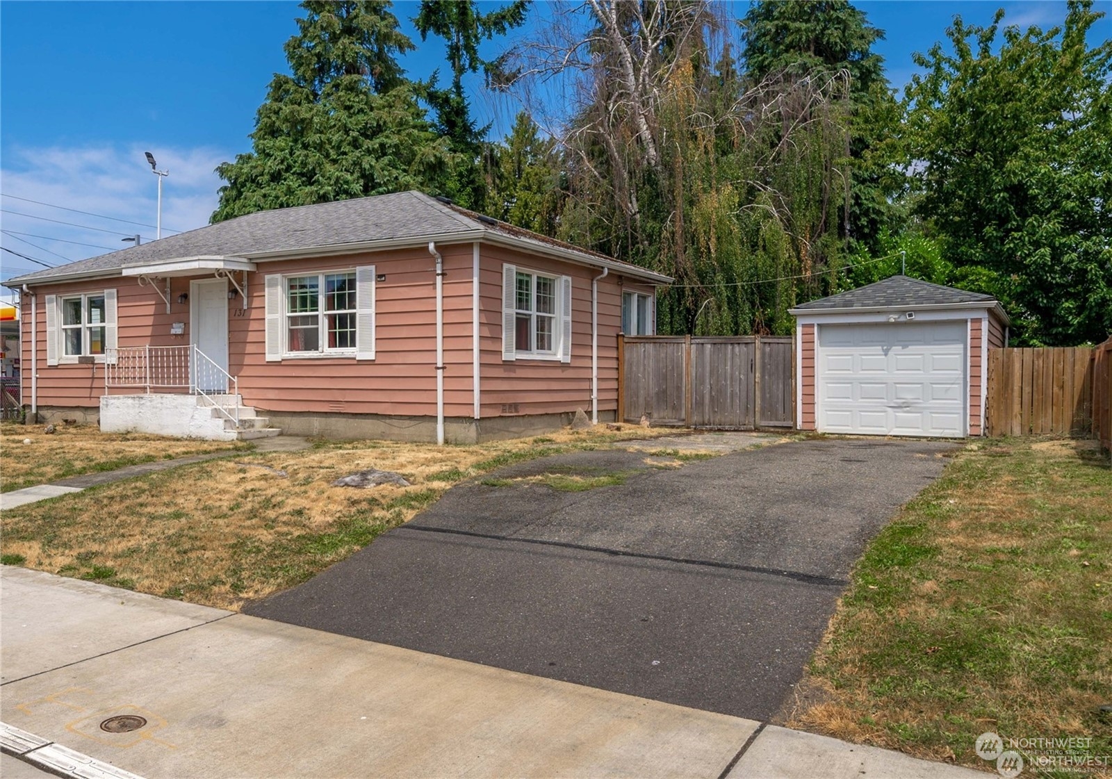 a front view of a house with a garage