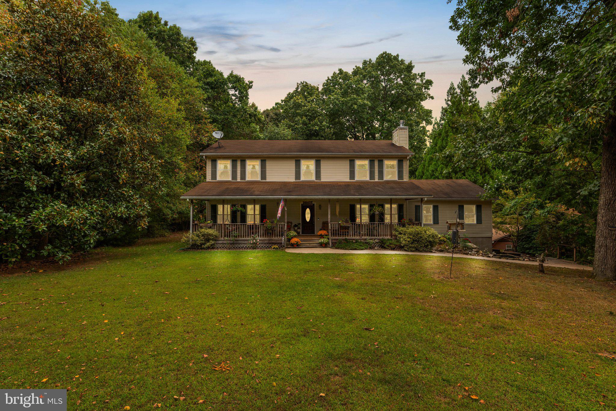 a front view of a house with swimming pool