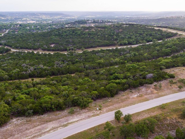 an aerial view of a town with trees