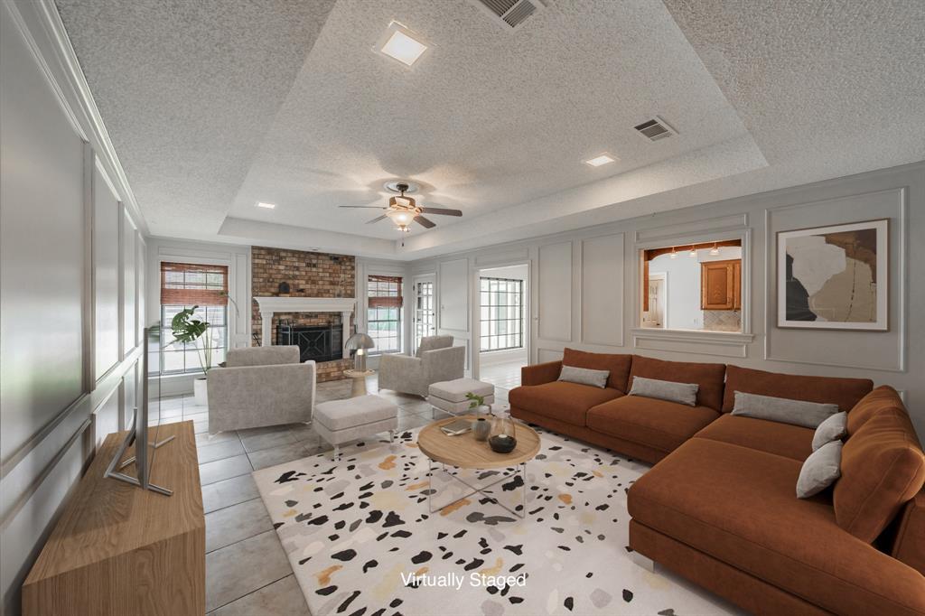 a living room with furniture or couch and a fireplace